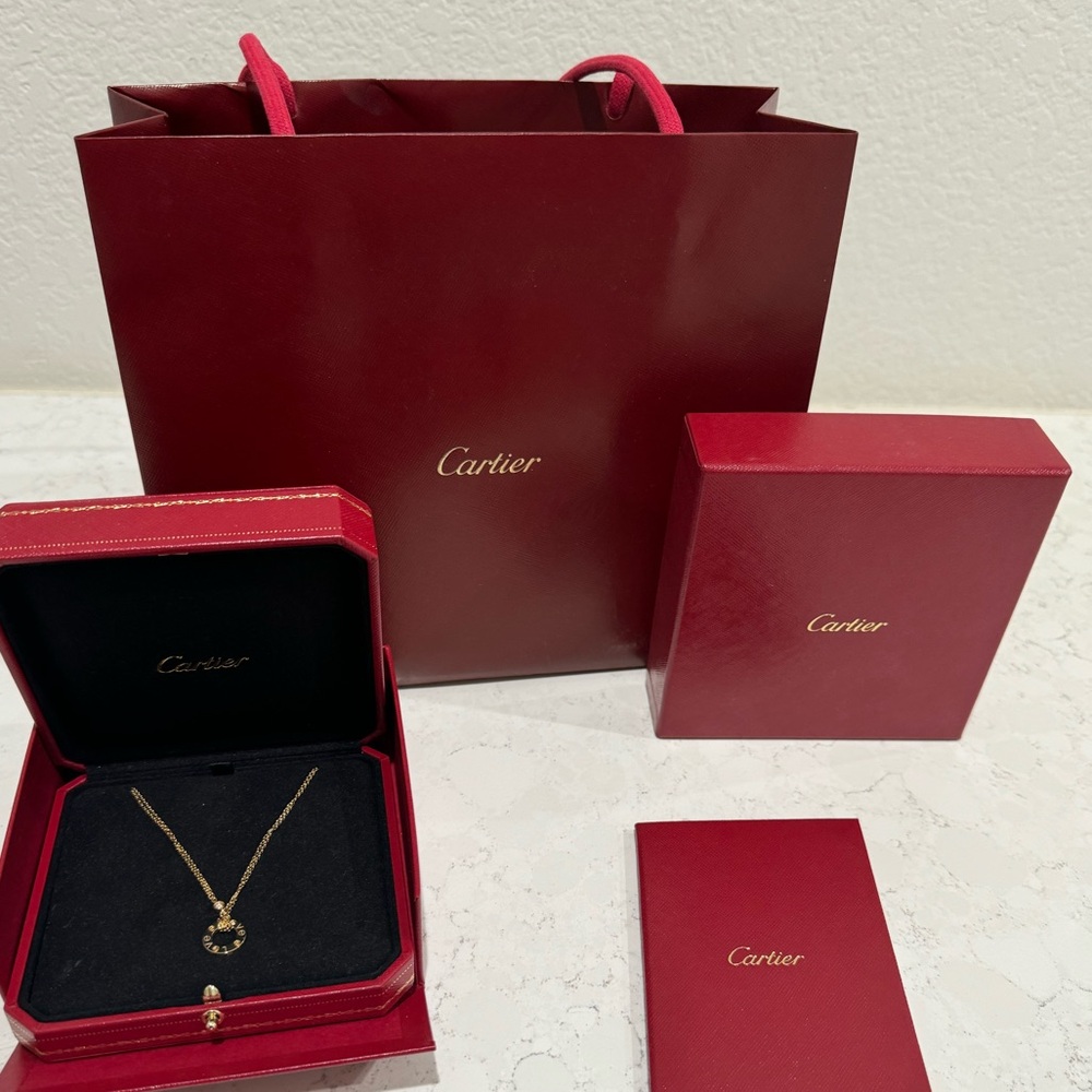 Cartier gold love necklace